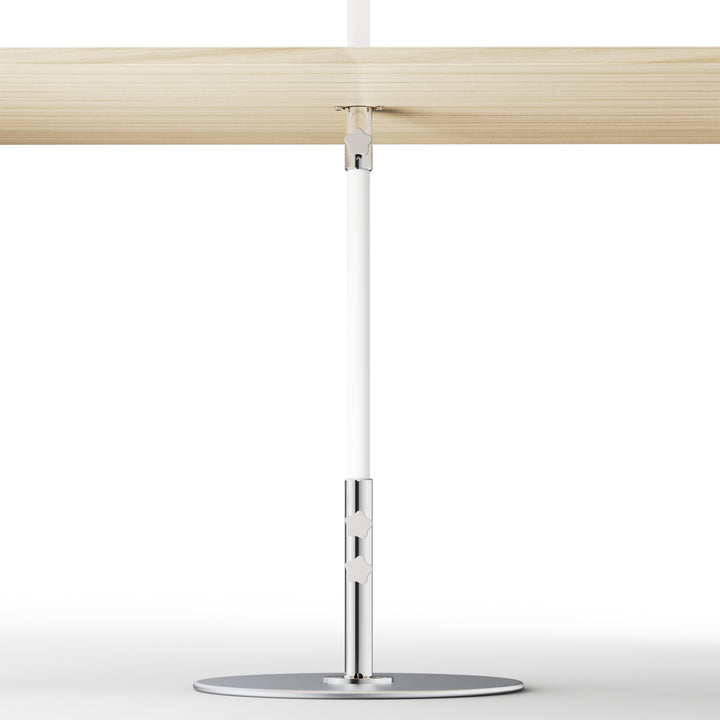 Basil Bangs table mount for patio umbrellas, installed in timber table. Improves umbrella stability and security for commercial venues.