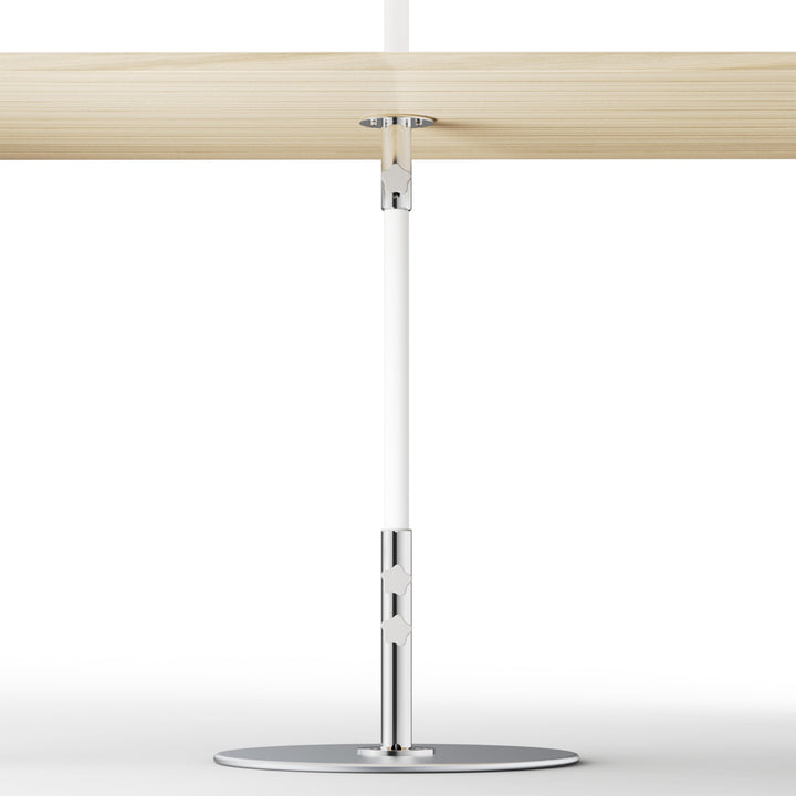 Basil Bangs table mount for patio umbrellas, installed in timber table. Improves umbrella stability and security for commercial venues.