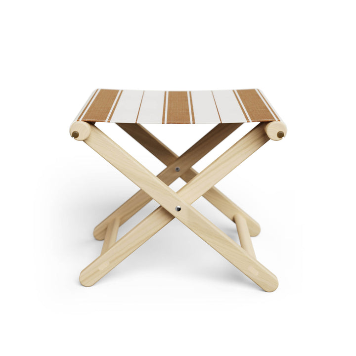 Basil Bangs Footstool, a portable outdoor footrest with a solid European Ash timber frame and outdoor acrylic fabric sling