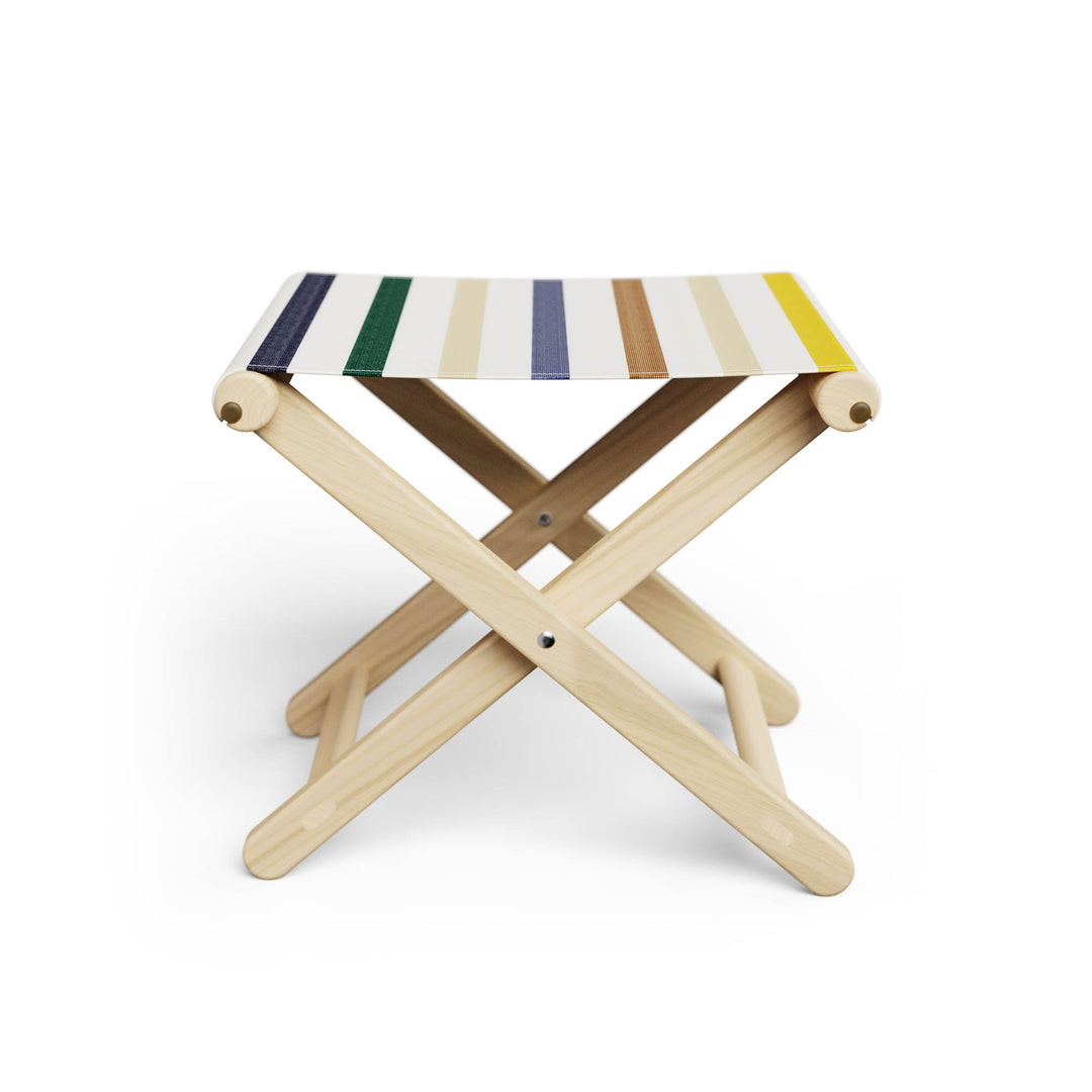 Basil Bangs Footstool, a portable outdoor footrest with a solid European Ash timber frame and outdoor acrylic fabric sling