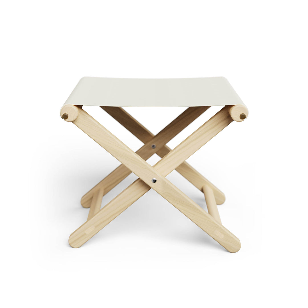 Basil Bangs Footstool, a portable outdoor footrest with a solid European Ash timber frame and outdoor acrylic fabric sling