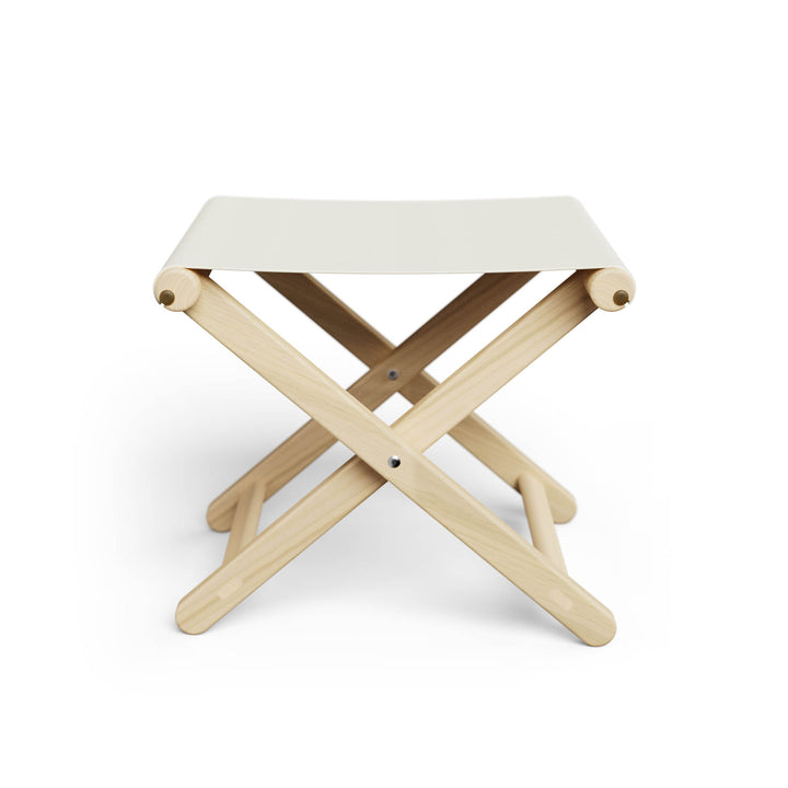 Basil Bangs Footstool, a portable outdoor footrest with a solid European Ash timber frame and outdoor acrylic fabric sling