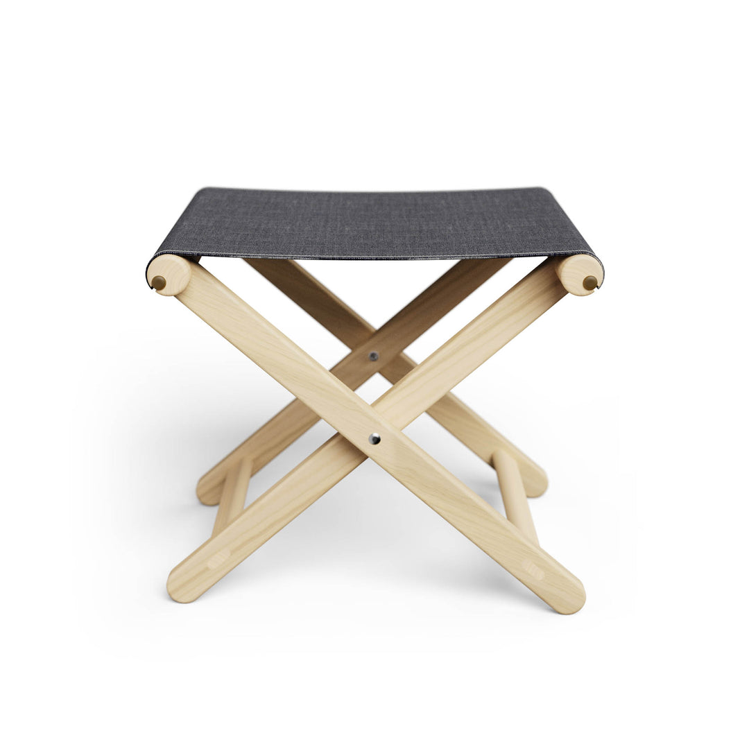 Basil Bangs Footstool, a portable outdoor footrest with a solid European Ash timber frame and outdoor acrylic fabric sling