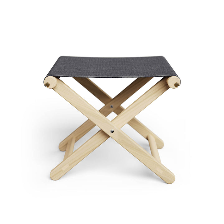 Basil Bangs Footstool, a portable outdoor footrest with a solid European Ash timber frame and outdoor acrylic fabric sling