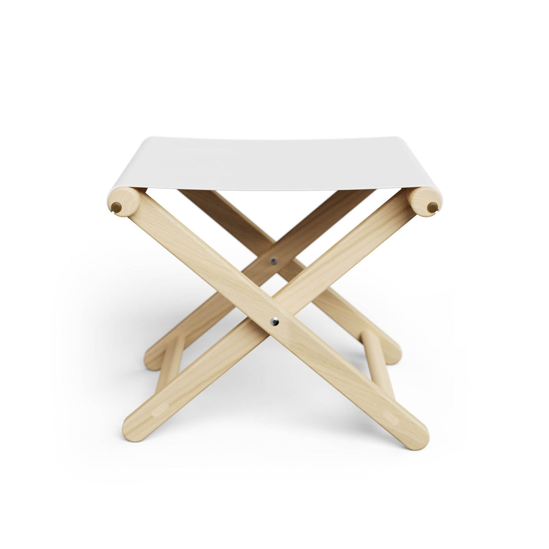 Basil Bangs Footstool, a portable outdoor footrest with a solid European Ash timber frame and outdoor acrylic fabric sling