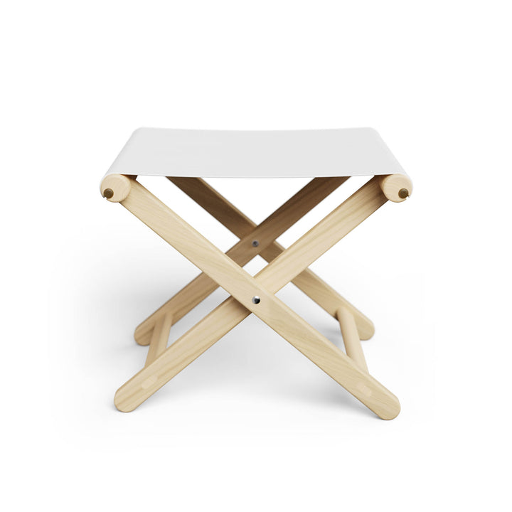 Basil Bangs Footstool, a portable outdoor footrest with a solid European Ash timber frame and outdoor acrylic fabric sling