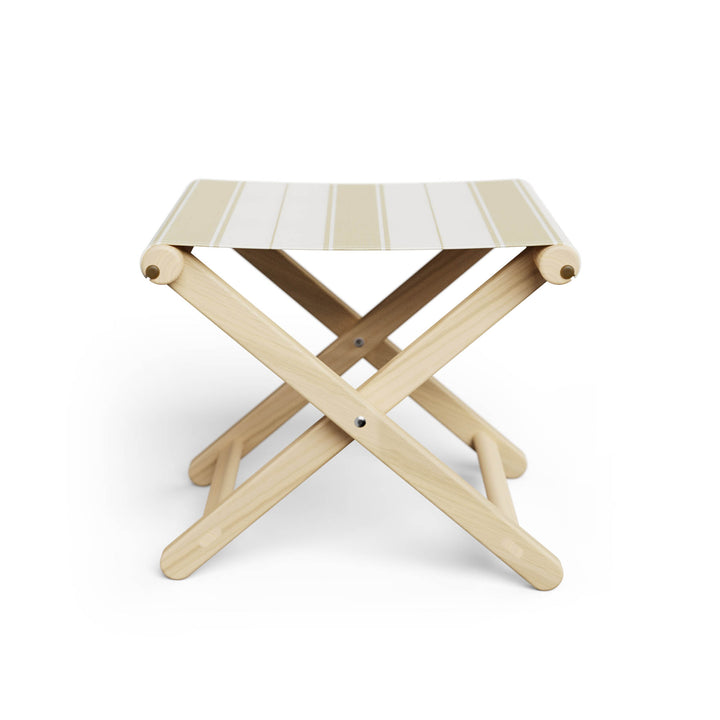 Basil Bangs Footstool, a portable outdoor footrest with a solid European Ash timber frame and outdoor acrylic fabric sling