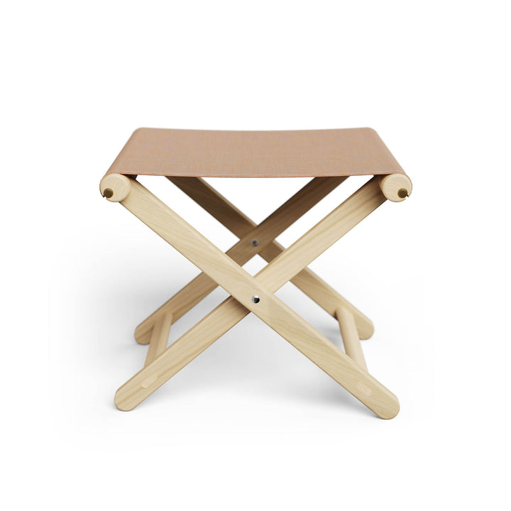 Basil Bangs Footstool, a portable outdoor footrest with a solid European Ash timber frame and outdoor acrylic fabric sling