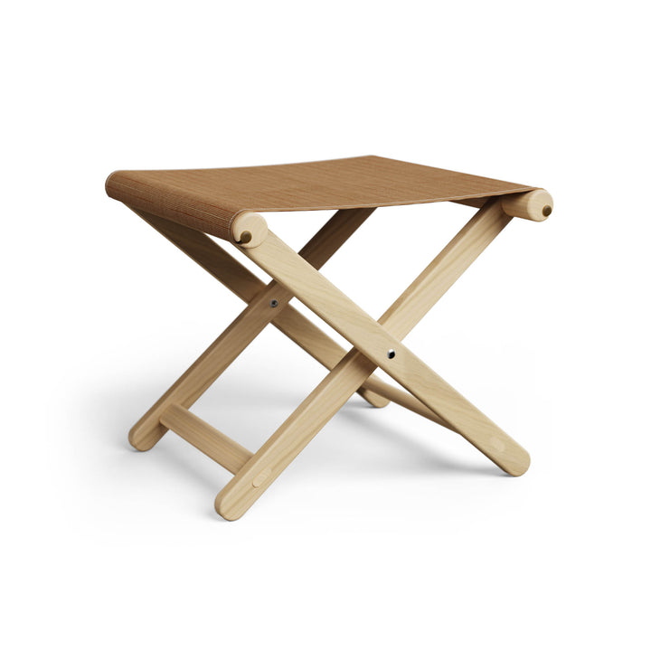 Basil Bangs Footstool, a portable outdoor footrest with a solid European Ash timber frame and outdoor acrylic fabric sling