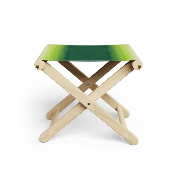 Basil Bangs Footstool, a portable outdoor footrest with a solid European Ash timber frame and outdoor acrylic fabric sling