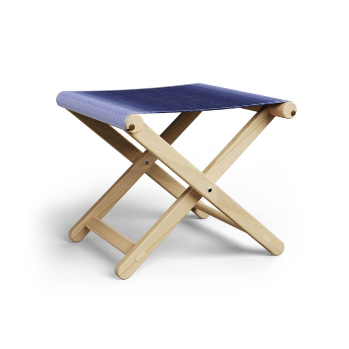 Basil Bangs Footstool, a portable outdoor footrest with a solid European Ash timber frame and outdoor acrylic fabric sling
