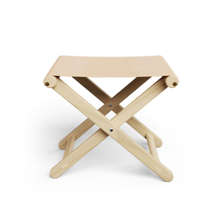 Basil Bangs Footstool, a portable outdoor footrest with a solid European Ash timber frame and outdoor acrylic fabric sling