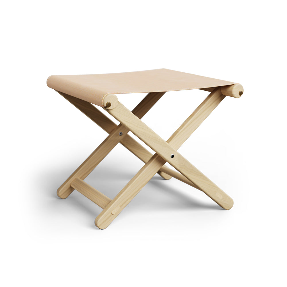 Basil Bangs Footstool, a portable outdoor footrest with a solid European Ash timber frame and outdoor acrylic fabric sling