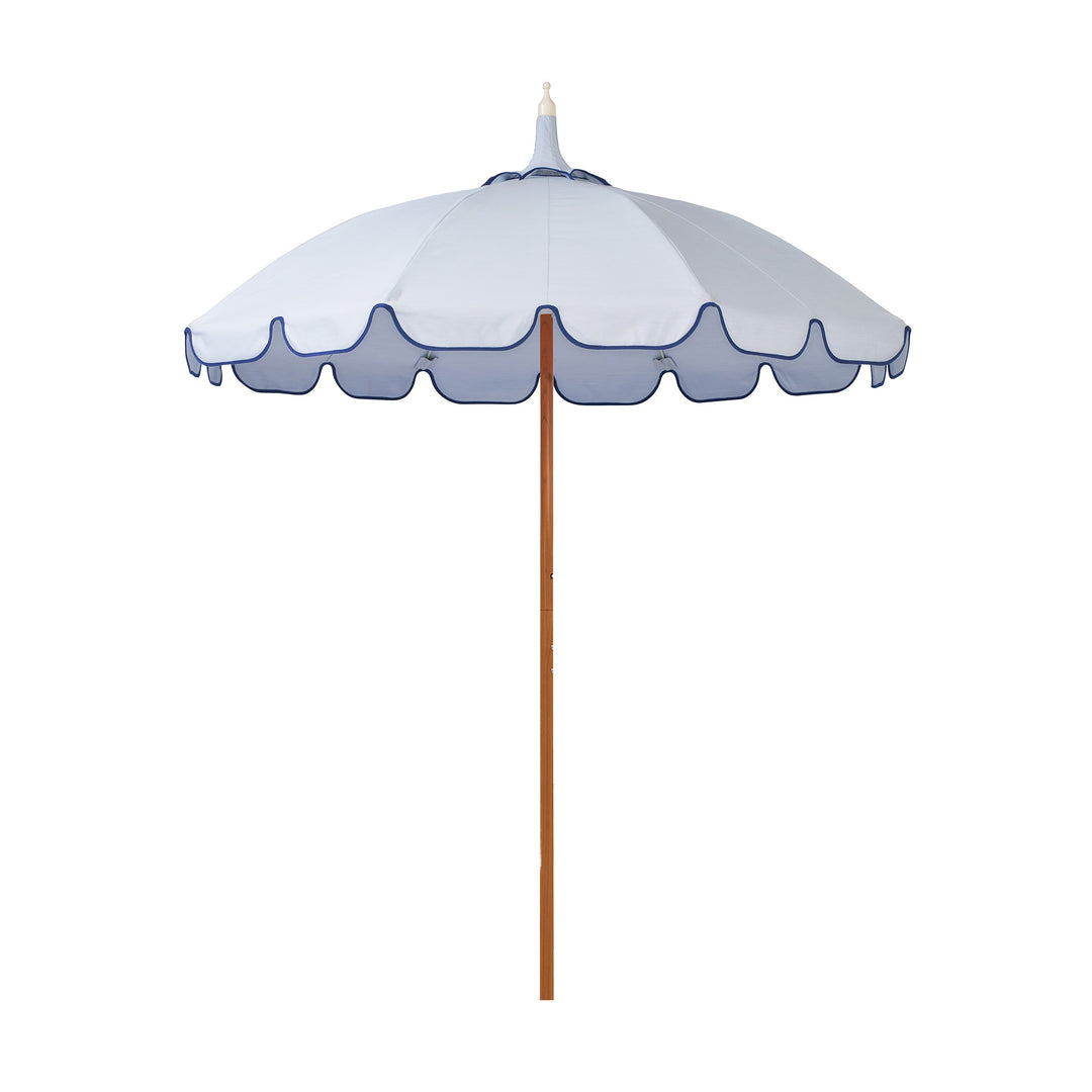 Basil Bangs Pagoda 2.1m commercial patio umbrella with a dusk blue canopy and marine binding scalloped valance and a woodgrain powder-coated frame.