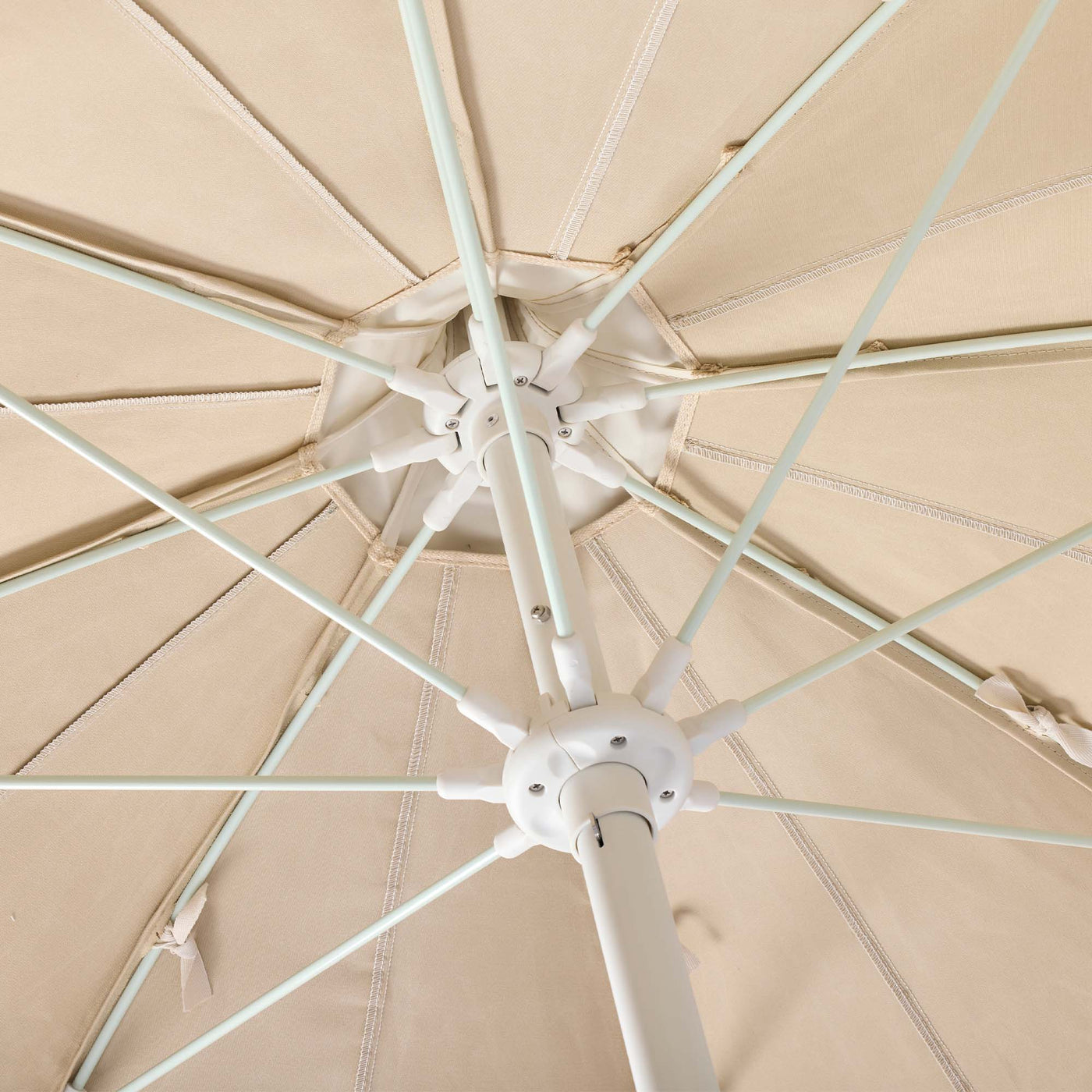 Basil Bangs Pagoda 2.1m commercial patio umbrella internal frame detail showing white powder-coated centre pole and fibreglass ribs