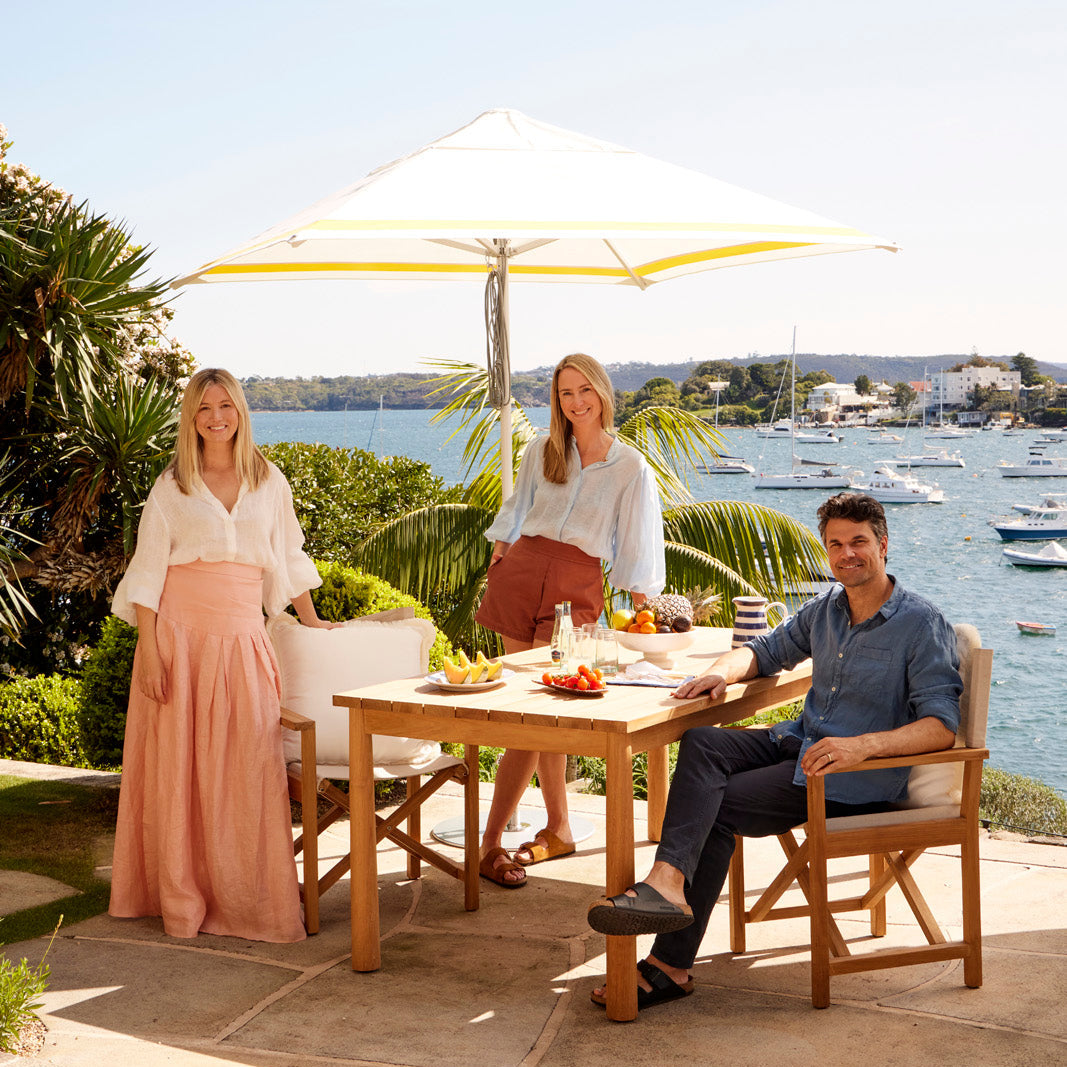 Lucy Montgomery with Mike and Krista under a collaborative Regatta Collection Patio Umbrella