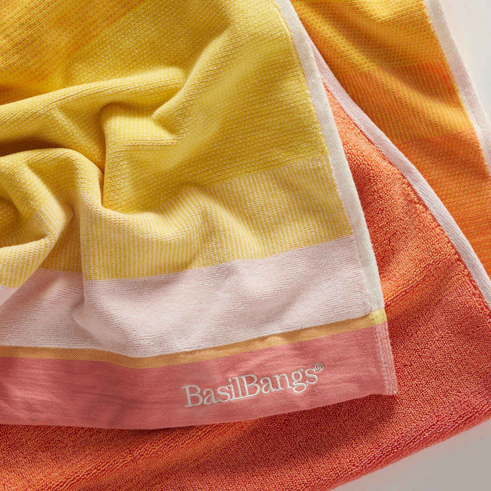 Luxury cotton beach towel in Ombre Gelato, featuring soft gradient hues and plush texture, perfect for beach days and poolside lounging. Close Up