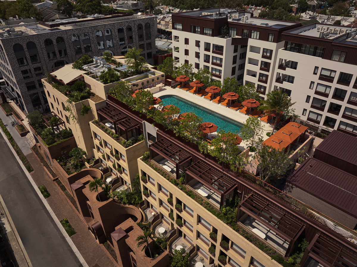 The Eve Hotel Pool in Sydney featuring Basil Bangs Double Caspar Umbrellas.