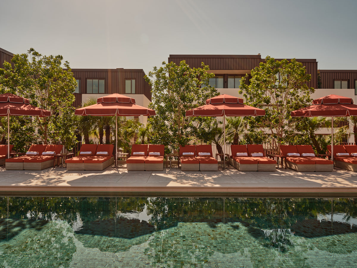 The Eve Hotel Pool in Sydney featuring Basil Bangs Double Caspar Umbrellas.