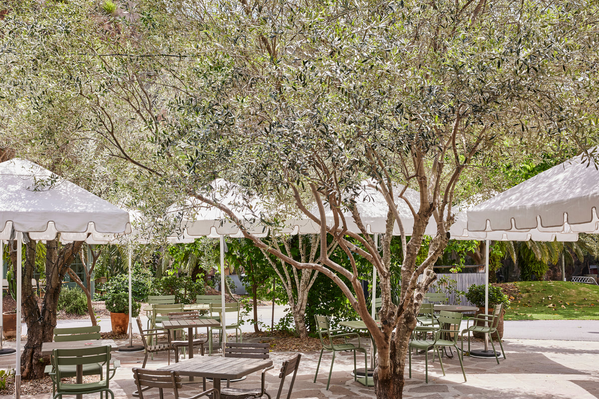 Basil Bangs commercial patio umbrella in white keyhole valance romantic