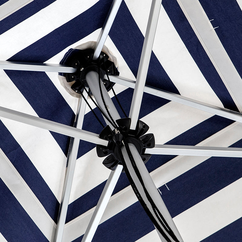 Go Large Umbrella by Basil Bangs, an engineer-certified, wind-rated patio umbrella with a reinforced aluminium frame for residential and commercial use.